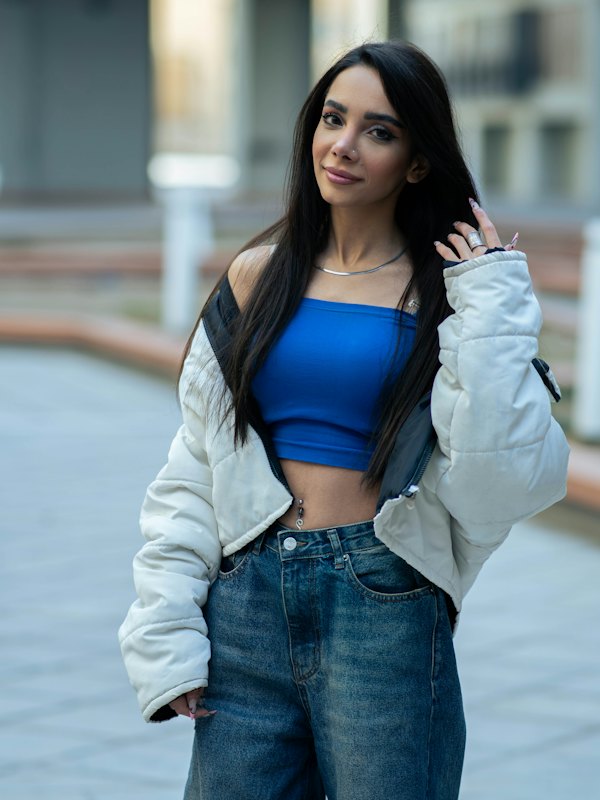 Woman in a puffer jacket and jeans
